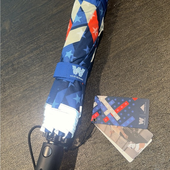 New Folds of honor umbrella.Designed by a weatherman Download app to get alerts. - Picture 6 of 10